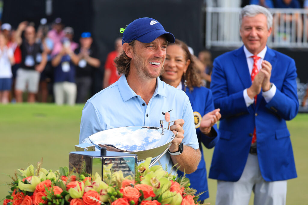ATLANTA, GA - AUGUST 24: Tommy Fleetwood of England is all smiles as he accepts the trophy for winning the Tour Championship after final round of the PGA FedEx Cup Playoffs on Sunday August 24, 2025 at East Lake Golf Club in Atlanta, Georgia. (Photo by David J. Griffin/Icon Sportswire)