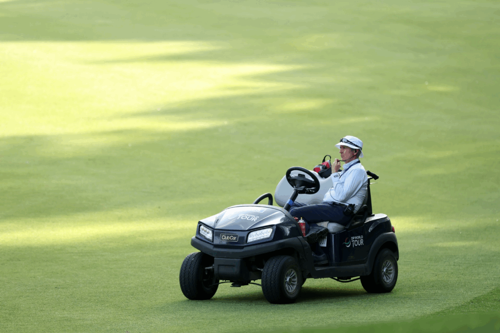 Club Car Fleet Ready to Drive European Swing DP World Tour Rules Official Mark Litton on a Club Car vehicle